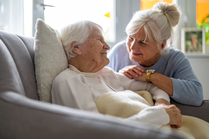 a woman taking care of another woman