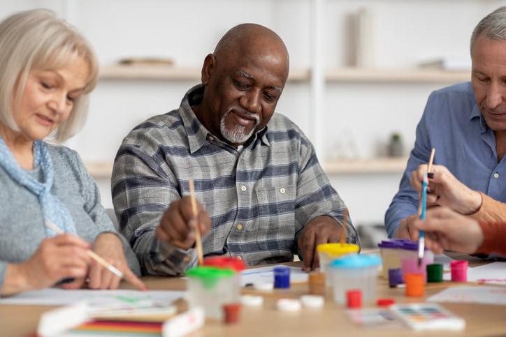 Innovative Dementia Therapies What’s New A man in art therapy