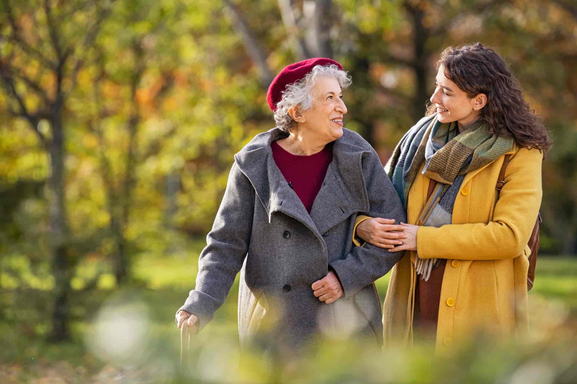 Two women walking outside